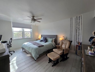 Welcome to this gut-renovated 2-bedroom, 2-bathroom penthouse on The Club at Emerald Hills in Florida - for sale on GolfHomes.com, golf home, golf lot