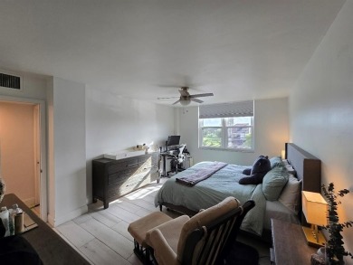 Welcome to this gut-renovated 2-bedroom, 2-bathroom penthouse on The Club at Emerald Hills in Florida - for sale on GolfHomes.com, golf home, golf lot