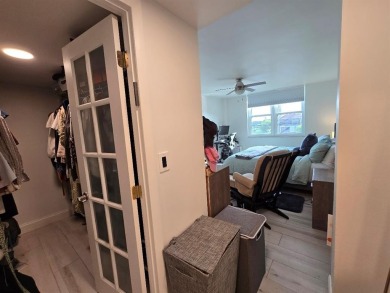 Welcome to this gut-renovated 2-bedroom, 2-bathroom penthouse on The Club at Emerald Hills in Florida - for sale on GolfHomes.com, golf home, golf lot