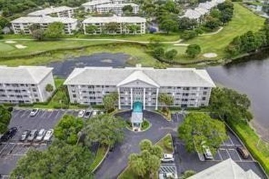 Lakefront Golf Course Condo. Move-in ready and beautifully on Pine Island Ridge Country Club in Florida - for sale on GolfHomes.com, golf home, golf lot