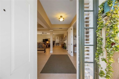 Discover refined Florida living at 23619 Awabuki Drive in the on Sarasota National Golf Club in Florida - for sale on GolfHomes.com, golf home, golf lot