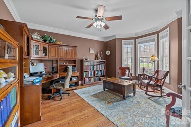 This five-bedroom, four-and-a-half-bathroom full brick home is on Emerald Lake Golf Club in North Carolina - for sale on GolfHomes.com, golf home, golf lot