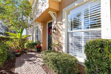 Discover refined Florida living at 23619 Awabuki Drive in the on Sarasota National Golf Club in Florida - for sale on GolfHomes.com, golf home, golf lot