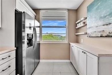 Lakefront Golf Course Condo. Move-in ready and beautifully on Pine Island Ridge Country Club in Florida - for sale on GolfHomes.com, golf home, golf lot