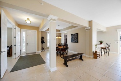 Discover refined Florida living at 23619 Awabuki Drive in the on Sarasota National Golf Club in Florida - for sale on GolfHomes.com, golf home, golf lot