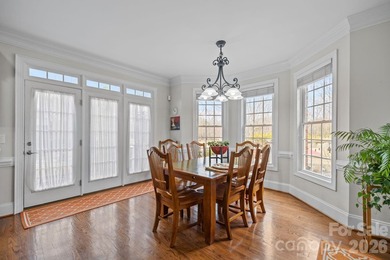 This five-bedroom, four-and-a-half-bathroom full brick home is on Emerald Lake Golf Club in North Carolina - for sale on GolfHomes.com, golf home, golf lot