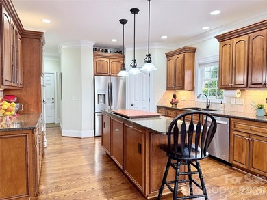 This five-bedroom, four-and-a-half-bathroom full brick home is on Emerald Lake Golf Club in North Carolina - for sale on GolfHomes.com, golf home, golf lot