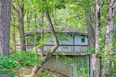Tucked in Sky Valley's golf community, this tiny treehouse on Sky Valley Resort and Country Club in Georgia - for sale on GolfHomes.com, golf home, golf lot