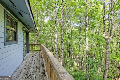Tucked in Sky Valley's golf community, this tiny treehouse on Sky Valley Resort and Country Club in Georgia - for sale on GolfHomes.com, golf home, golf lot
