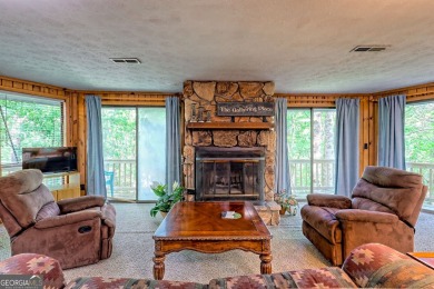 Tucked in Sky Valley's golf community, this tiny treehouse on Sky Valley Resort and Country Club in Georgia - for sale on GolfHomes.com, golf home, golf lot