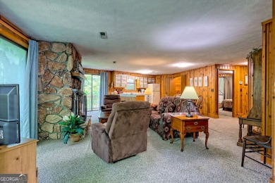 Tucked in Sky Valley's golf community, this tiny treehouse on Sky Valley Resort and Country Club in Georgia - for sale on GolfHomes.com, golf home, golf lot