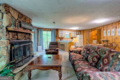Tucked in Sky Valley's golf community, this tiny treehouse on Sky Valley Resort and Country Club in Georgia - for sale on GolfHomes.com, golf home, golf lot