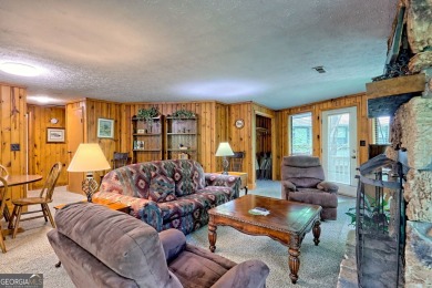 Tucked in Sky Valley's golf community, this tiny treehouse on Sky Valley Resort and Country Club in Georgia - for sale on GolfHomes.com, golf home, golf lot