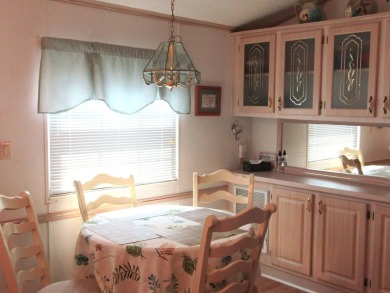 PRICE REDUCTION!!!!   This cozy, well-maintained and cared for on Deer Creek RV Golf Resort in Florida - for sale on GolfHomes.com, golf home, golf lot