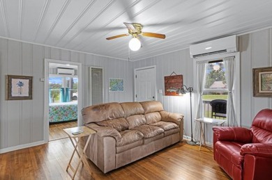 Ride your golf cart to dining, the beach, and downtown from this on Rockport Country Club in Texas - for sale on GolfHomes.com, golf home, golf lot