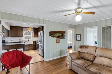 Ride your golf cart to dining, the beach, and downtown from this on Rockport Country Club in Texas - for sale on GolfHomes.com, golf home, golf lot