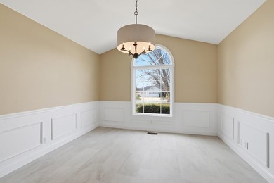 Experience refined living in this impeccable custom home nestled on Falcons Lair Golf Club in South Carolina - for sale on GolfHomes.com, golf home, golf lot