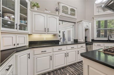 Situated on the prestigious 6th fairway of Eagle Crest Golf on Eagle Crest Golf Course in Arkansas - for sale on GolfHomes.com, golf home, golf lot