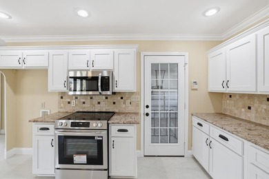 Experience refined living in this impeccable custom home nestled on Falcons Lair Golf Club in South Carolina - for sale on GolfHomes.com, golf home, golf lot