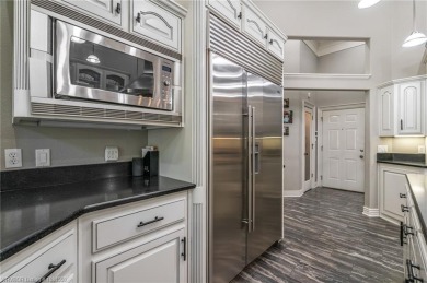 Situated on the prestigious 6th fairway of Eagle Crest Golf on Eagle Crest Golf Course in Arkansas - for sale on GolfHomes.com, golf home, golf lot