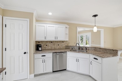 Experience refined living in this impeccable custom home nestled on Falcons Lair Golf Club in South Carolina - for sale on GolfHomes.com, golf home, golf lot