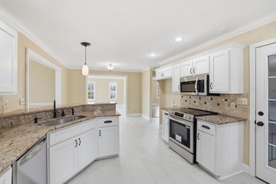 Experience refined living in this impeccable custom home nestled on Falcons Lair Golf Club in South Carolina - for sale on GolfHomes.com, golf home, golf lot