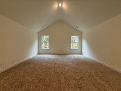 Stunning 2-story home with a 3rd car garage in a coveted on Traditions of Braselton Golf Club in Georgia - for sale on GolfHomes.com, golf home, golf lot