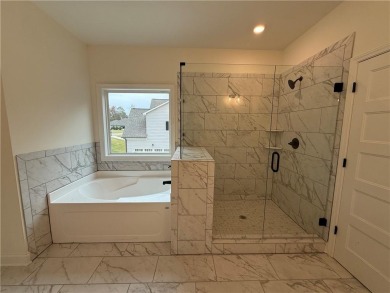 Stunning 2-story home with a 3rd car garage in a coveted on Traditions of Braselton Golf Club in Georgia - for sale on GolfHomes.com, golf home, golf lot