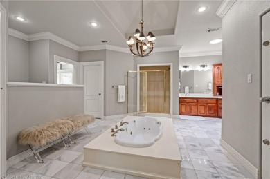 Situated on the prestigious 6th fairway of Eagle Crest Golf on Eagle Crest Golf Course in Arkansas - for sale on GolfHomes.com, golf home, golf lot