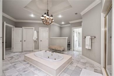 Situated on the prestigious 6th fairway of Eagle Crest Golf on Eagle Crest Golf Course in Arkansas - for sale on GolfHomes.com, golf home, golf lot