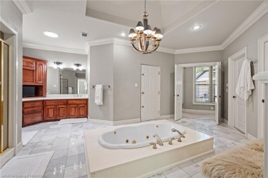 Situated on the prestigious 6th fairway of Eagle Crest Golf on Eagle Crest Golf Course in Arkansas - for sale on GolfHomes.com, golf home, golf lot