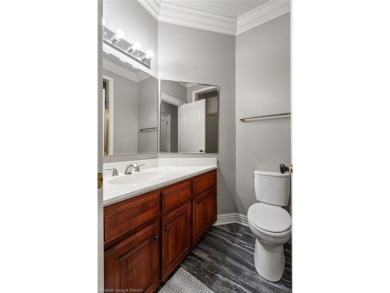 Situated on the prestigious 6th fairway of Eagle Crest Golf on Eagle Crest Golf Course in Arkansas - for sale on GolfHomes.com, golf home, golf lot