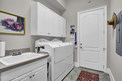 SELLER OFFERIG $5000 IN CLOSING COSTS! Incredible pond views on Carolina National Golf Club in North Carolina - for sale on GolfHomes.com, golf home, golf lot