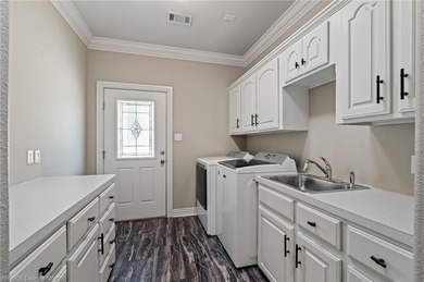 Situated on the prestigious 6th fairway of Eagle Crest Golf on Eagle Crest Golf Course in Arkansas - for sale on GolfHomes.com, golf home, golf lot