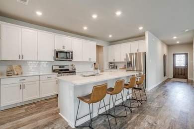 This two-story house in Ventana is a haven for entertainment and on Whitestone Golf Club in Texas - for sale on GolfHomes.com, golf home, golf lot