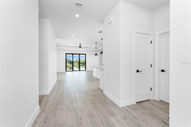 One or more photo(s) has been virtually staged. Experience on Rotonda Golf and Country Club The Palms Course in Florida - for sale on GolfHomes.com, golf home, golf lot