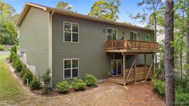 Welcome to this meticulously crafted 4-bedroom, 3-bathroom home on Country Club of North Carolina in North Carolina - for sale on GolfHomes.com, golf home, golf lot