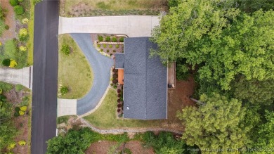 Welcome to this meticulously crafted 4-bedroom, 3-bathroom home on Country Club of North Carolina in North Carolina - for sale on GolfHomes.com, golf home, golf lot