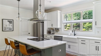 Welcome to this meticulously crafted 4-bedroom, 3-bathroom home on Country Club of North Carolina in North Carolina - for sale on GolfHomes.com, golf home, golf lot