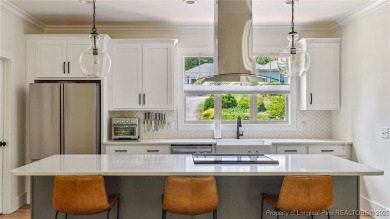 Welcome to this meticulously crafted 4-bedroom, 3-bathroom home on Country Club of North Carolina in North Carolina - for sale on GolfHomes.com, golf home, golf lot