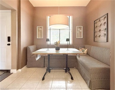 This light-filled 2-bedroom, 2-bath condominium offers the on Naples Heritage Golf and Country Club in Florida - for sale on GolfHomes.com, golf home, golf lot