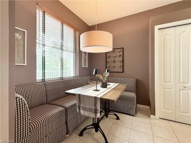 This light-filled 2-bedroom, 2-bath condominium offers the on Naples Heritage Golf and Country Club in Florida - for sale on GolfHomes.com, golf home, golf lot