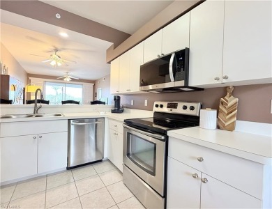 This light-filled 2-bedroom, 2-bath condominium offers the on Naples Heritage Golf and Country Club in Florida - for sale on GolfHomes.com, golf home, golf lot