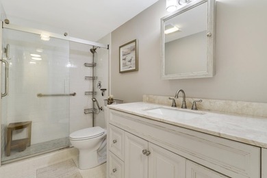 Spacious and stylish, this 2 bed/2 bath first-floor condo is on BallenIsles Golf and Country Club in Florida - for sale on GolfHomes.com, golf home, golf lot