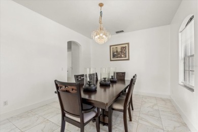 Welcome to this stunning 6-bedroom, 4.5-bath home in the heart on Mayfair Country Club in Florida - for sale on GolfHomes.com, golf home, golf lot