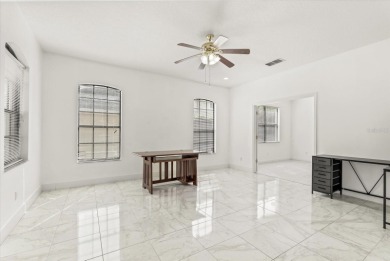 Welcome to this stunning 6-bedroom, 4.5-bath home in the heart on Mayfair Country Club in Florida - for sale on GolfHomes.com, golf home, golf lot