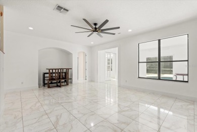 Welcome to this stunning 6-bedroom, 4.5-bath home in the heart on Mayfair Country Club in Florida - for sale on GolfHomes.com, golf home, golf lot