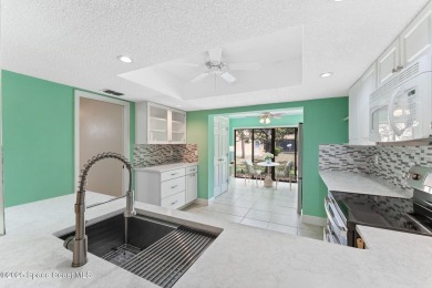 Beautiful end-unit townhome in a prime Suntree location offering on Suntree Country Club in Florida - for sale on GolfHomes.com, golf home, golf lot