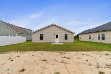 Discover this nearly new, charming single-level home with a low on Lennon Hills Golf Course in North Carolina - for sale on GolfHomes.com, golf home, golf lot