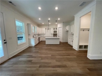 Stunning 2-story home with a 3rd car garage in a coveted on Traditions of Braselton Golf Club in Georgia - for sale on GolfHomes.com, golf home, golf lot